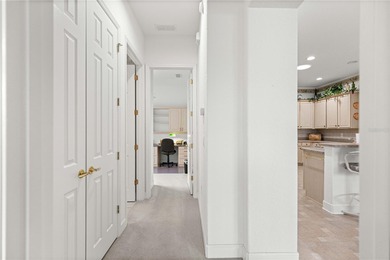 Luxurious Hampton model boasts French glass double French doors on Eagle Ridge At Spruce Creek Country Club in Florida - for sale on GolfHomes.com, golf home, golf lot
