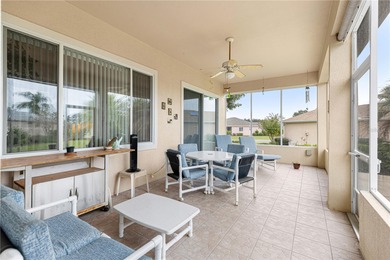 Luxurious Hampton model boasts French glass double French doors on Eagle Ridge At Spruce Creek Country Club in Florida - for sale on GolfHomes.com, golf home, golf lot