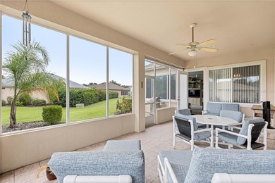 Luxurious Hampton model boasts French glass double French doors on Eagle Ridge At Spruce Creek Country Club in Florida - for sale on GolfHomes.com, golf home, golf lot