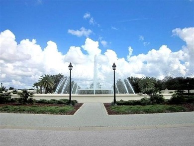 Luxurious Hampton model boasts French glass double French doors on Eagle Ridge At Spruce Creek Country Club in Florida - for sale on GolfHomes.com, golf home, golf lot