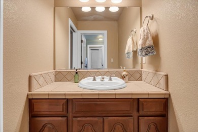 Lakefront living at its absolute finest! Stunning, custom-built on The Club at Copper Valley Golf Course in California - for sale on GolfHomes.com, golf home, golf lot