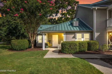 Welcome to this exceptional end-unit first-floor condominium on Carolina National Golf Club in North Carolina - for sale on GolfHomes.com, golf home, golf lot