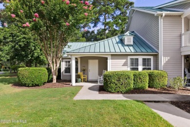 Welcome to this exceptional end-unit first-floor condominium on Carolina National Golf Club in North Carolina - for sale on GolfHomes.com, golf home, golf lot