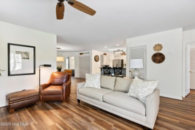 Welcome to this exceptional end-unit first-floor condominium on Carolina National Golf Club in North Carolina - for sale on GolfHomes.com, golf home, golf lot