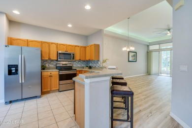 This beautifully maintained 2-bedroom, 2-bathroom single-level on LPGA International Golf Course in Florida - for sale on GolfHomes.com, golf home, golf lot