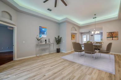 This beautifully maintained 2-bedroom, 2-bathroom single-level on LPGA International Golf Course in Florida - for sale on GolfHomes.com, golf home, golf lot