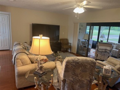 VILLA with TRANQUIL GOLF COURSE VIEWS IN EAST LAKE WOODLANDS on East Lake Woodlands Country Club in Florida - for sale on GolfHomes.com, golf home, golf lot