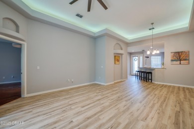 This beautifully maintained 2-bedroom, 2-bathroom single-level on LPGA International Golf Course in Florida - for sale on GolfHomes.com, golf home, golf lot