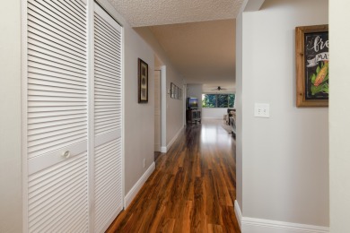 Nicely maintained two bedroom, two bath  corner unit condo in on Forest Oaks Golf Club in Florida - for sale on GolfHomes.com, golf home, golf lot