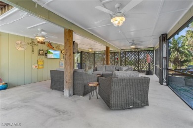 Welcome to 14148 Sandarac Dr, Bokeelia, FL--a beautifully on Alden Pines Golf Club in Florida - for sale on GolfHomes.com, golf home, golf lot