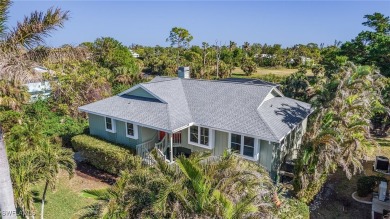 Welcome to 14148 Sandarac Dr, Bokeelia, FL--a beautifully on Alden Pines Golf Club in Florida - for sale on GolfHomes.com, golf home, golf lot