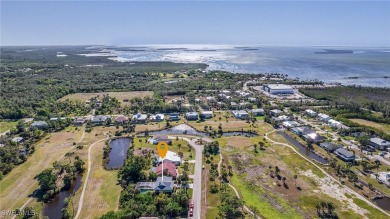 Welcome to 14148 Sandarac Dr, Bokeelia, FL--a beautifully on Alden Pines Golf Club in Florida - for sale on GolfHomes.com, golf home, golf lot