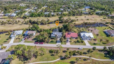 Welcome to 14148 Sandarac Dr, Bokeelia, FL--a beautifully on Alden Pines Golf Club in Florida - for sale on GolfHomes.com, golf home, golf lot