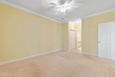 This 3 BR, 2.5 bathroom Osprey Ridge end unit condo in the on Sea Trail Golf Resort in North Carolina - for sale on GolfHomes.com, golf home, golf lot