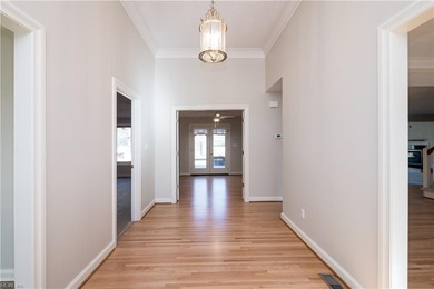 Beautiful and stately brick home. You're greeted into the home on Cypress Point Country Club in Virginia - for sale on GolfHomes.com, golf home, golf lot