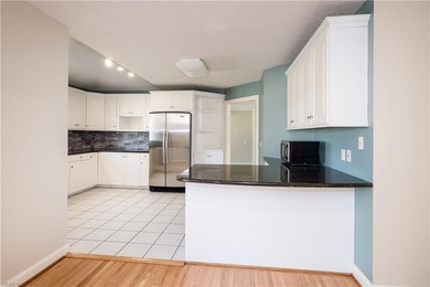 Beautiful and stately brick home. You're greeted into the home on Cypress Point Country Club in Virginia - for sale on GolfHomes.com, golf home, golf lot