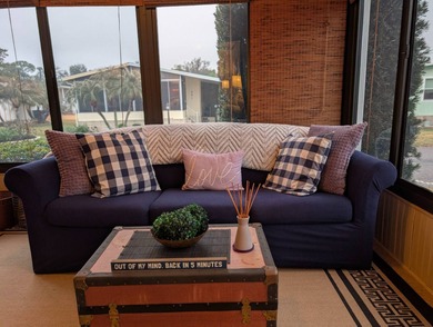 Experience the pinnacle of 55+ living in this impeccably on Grasslands Golf and Country Club in Florida - for sale on GolfHomes.com, golf home, golf lot