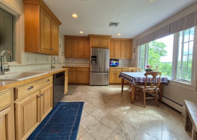 Discover the perfect blend of modern updates and timeless charm on Ridgewood Country Club in Connecticut - for sale on GolfHomes.com, golf home, golf lot