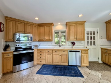 Discover the perfect blend of modern updates and timeless charm on Ridgewood Country Club in Connecticut - for sale on GolfHomes.com, golf home, golf lot