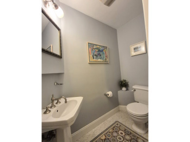 Discover the perfect blend of modern updates and timeless charm on Ridgewood Country Club in Connecticut - for sale on GolfHomes.com, golf home, golf lot