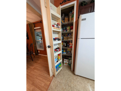 Experience the pinnacle of 55+ living in this impeccably on Grasslands Golf and Country Club in Florida - for sale on GolfHomes.com, golf home, golf lot