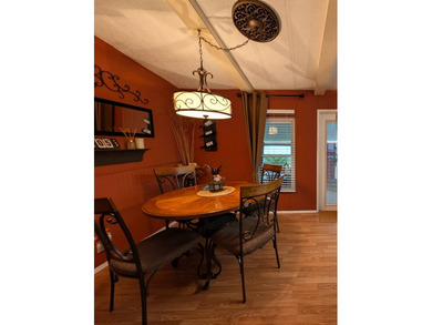 Experience the pinnacle of 55+ living in this impeccably on Grasslands Golf and Country Club in Florida - for sale on GolfHomes.com, golf home, golf lot