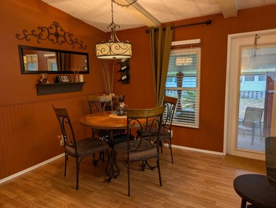 Experience the pinnacle of 55+ living in this impeccably on Grasslands Golf and Country Club in Florida - for sale on GolfHomes.com, golf home, golf lot