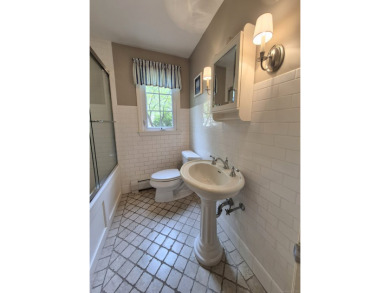 Discover the perfect blend of modern updates and timeless charm on Ridgewood Country Club in Connecticut - for sale on GolfHomes.com, golf home, golf lot