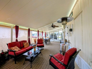 Experience the pinnacle of 55+ living in this impeccably on Grasslands Golf and Country Club in Florida - for sale on GolfHomes.com, golf home, golf lot