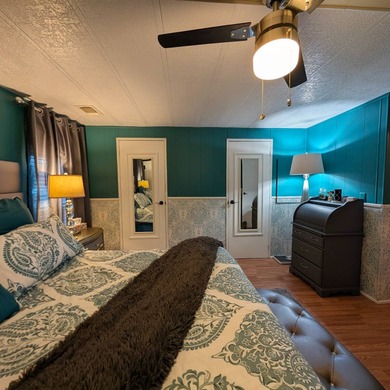 Experience the pinnacle of 55+ living in this impeccably on Grasslands Golf and Country Club in Florida - for sale on GolfHomes.com, golf home, golf lot