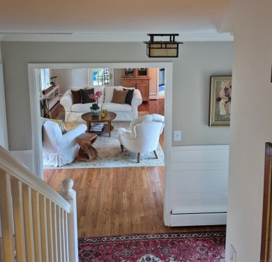 Discover the perfect blend of modern updates and timeless charm on Ridgewood Country Club in Connecticut - for sale on GolfHomes.com, golf home, golf lot