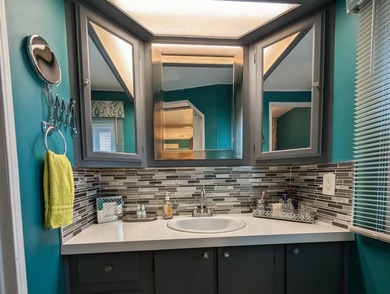 Experience the pinnacle of 55+ living in this impeccably on Grasslands Golf and Country Club in Florida - for sale on GolfHomes.com, golf home, golf lot