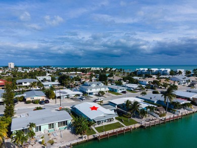 If you need more dockage than most half duplexes in Key Colony on Key Colony Beach Golf Course in Florida - for sale on GolfHomes.com, golf home, golf lot