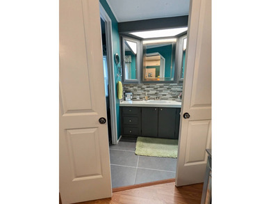 Experience the pinnacle of 55+ living in this impeccably on Grasslands Golf and Country Club in Florida - for sale on GolfHomes.com, golf home, golf lot