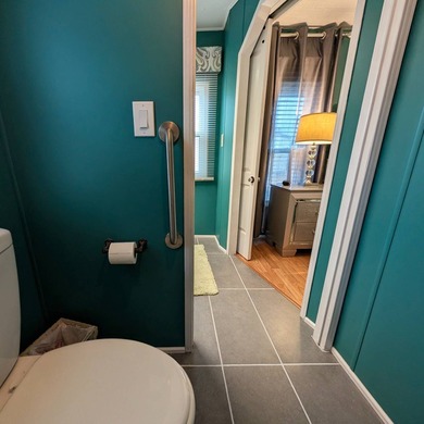 Experience the pinnacle of 55+ living in this impeccably on Grasslands Golf and Country Club in Florida - for sale on GolfHomes.com, golf home, golf lot