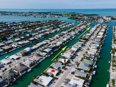If you need more dockage than most half duplexes in Key Colony on Key Colony Beach Golf Course in Florida - for sale on GolfHomes.com, golf home, golf lot