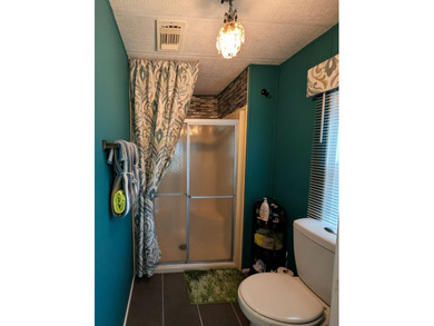 Experience the pinnacle of 55+ living in this impeccably on Grasslands Golf and Country Club in Florida - for sale on GolfHomes.com, golf home, golf lot