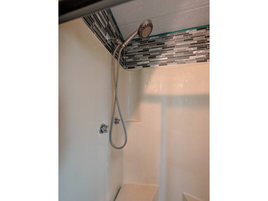 Experience the pinnacle of 55+ living in this impeccably on Grasslands Golf and Country Club in Florida - for sale on GolfHomes.com, golf home, golf lot