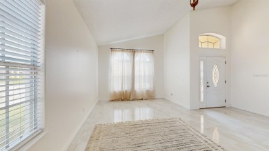 Welcome to your Florida oasis! This beautifully maintained on Oaks National Golf Course in Florida - for sale on GolfHomes.com, golf home, golf lot