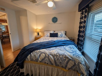 Experience the pinnacle of 55+ living in this impeccably on Grasslands Golf and Country Club in Florida - for sale on GolfHomes.com, golf home, golf lot