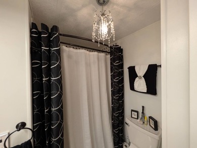 Experience the pinnacle of 55+ living in this impeccably on Grasslands Golf and Country Club in Florida - for sale on GolfHomes.com, golf home, golf lot