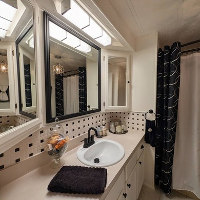 Experience the pinnacle of 55+ living in this impeccably on Grasslands Golf and Country Club in Florida - for sale on GolfHomes.com, golf home, golf lot