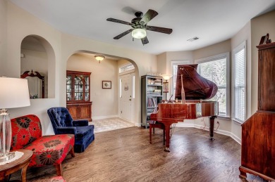 Versatility is the key to this beautiful, traditional two-story on TPC of Myrtle Beach in South Carolina - for sale on GolfHomes.com, golf home, golf lot