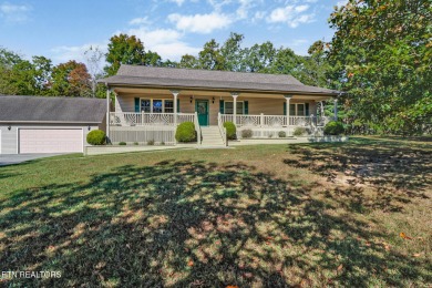 Lake-view living on a wooded acre-this 1,800 SF, single-level on Lake Tansi Village Country Club in Tennessee - for sale on GolfHomes.com, golf home, golf lot