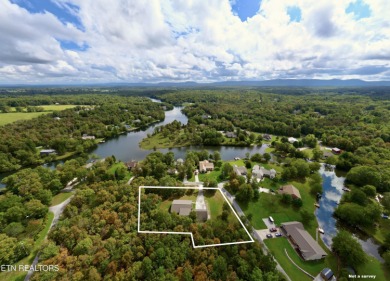 Lake-view living on a wooded acre-this 1,800 SF, single-level on Lake Tansi Village Country Club in Tennessee - for sale on GolfHomes.com, golf home, golf lot