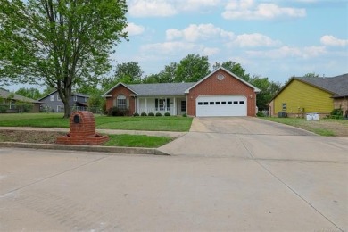 This well-kept home offers comfort, space, and a great location on Heritage Hills Golf Course in Oklahoma - for sale on GolfHomes.com, golf home, golf lot