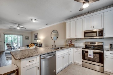Discover effortless coastal living in this beautifully on Barefoot Resort and Golf Club  in South Carolina - for sale on GolfHomes.com, golf home, golf lot
