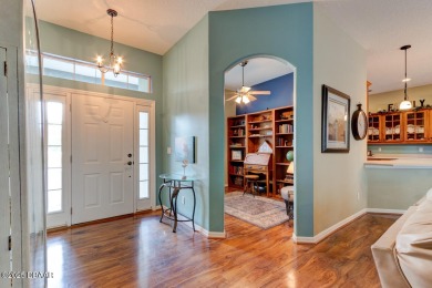 Welcome to your new home! This inviting 3-bedroom, 2-bath home on The Grand Club Cypress Course in Florida - for sale on GolfHomes.com, golf home, golf lot