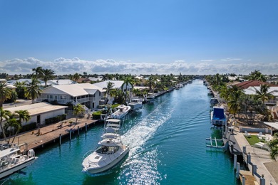 Experience the ease and elegance of true island living in this on Key Colony Beach Golf Course in Florida - for sale on GolfHomes.com, golf home, golf lot