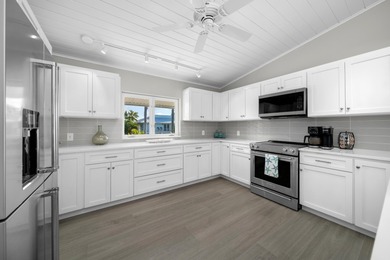 Experience the ease and elegance of true island living in this on Key Colony Beach Golf Course in Florida - for sale on GolfHomes.com, golf home, golf lot